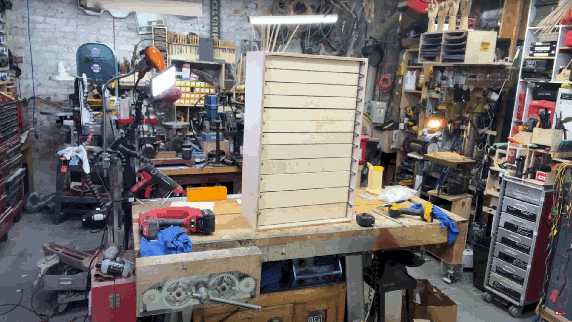 meeting-backgrounds/adam-savage-cave54c-drawers-animated.gif