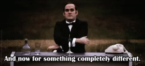 reaction/monty-python_and-now-for-something-completely-different.gif